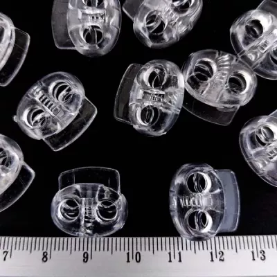 Стопор плоский овальний, прозорий