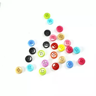 Гудзик пластик D 10/4, асорті, в уп. 50 шт.