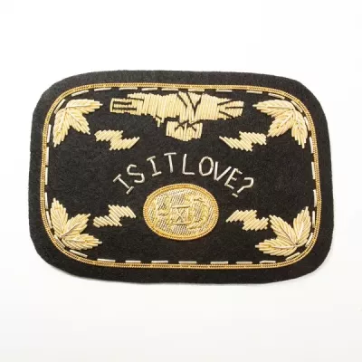 Бірка "Is It Love?"